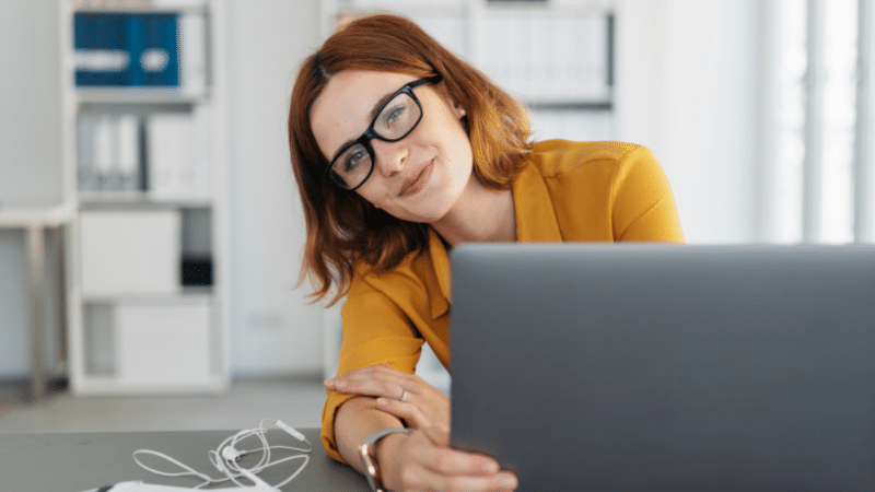 women looking at her laptop