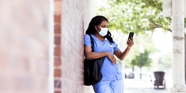 nurse checking phone