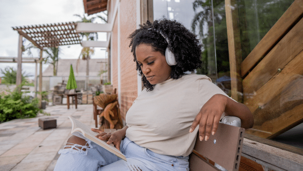 woman reading outside